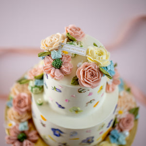 
                  
                    Load image into Gallery viewer, A close up on the hand piped buttercream flowers in pastel colours. They look incredibly realistic.
                  
                
