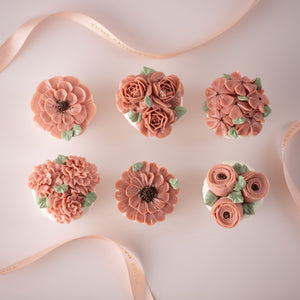 
                  
                    Load image into Gallery viewer, 6 cupcakes with assorted pink hand piped buttercream flowers on them.  The flowers look incredibly realistic.
                  
                